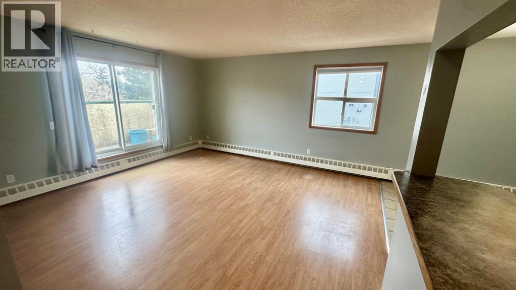 Apartment for Sale in 8, 6203 Bowness Road NW|Calgary, Alberta T3B0E2 5