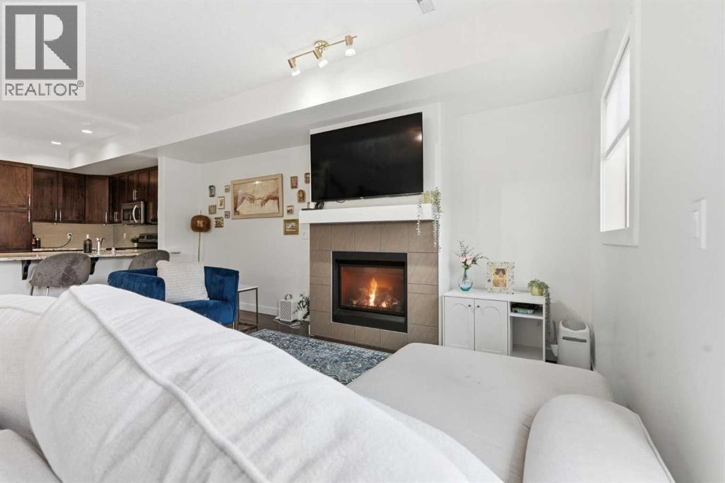 Row / Townhouse for Sale in 86 Cougar Ridge Landing SW|Calgary, Alberta T3H0X8 2