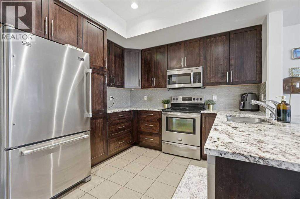 Row / Townhouse for Sale in 86 Cougar Ridge Landing SW|Calgary, Alberta T3H0X8 5