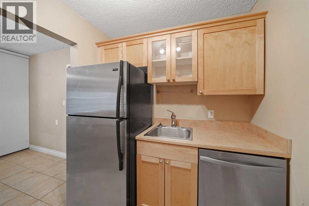 Apartment for Sale in 303, 1334 12 Avenue SW|Calgary, Alberta T3C3R9 5