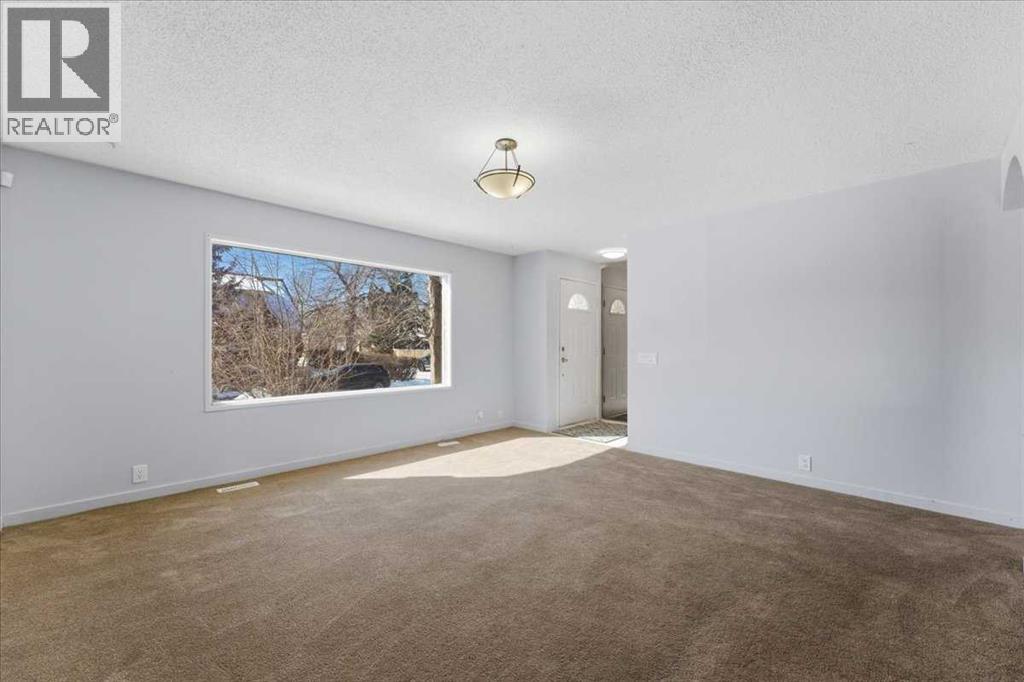 House for Sale in 716 Whitemont Drive NE|Calgary, Alberta T1Y2Z8 5