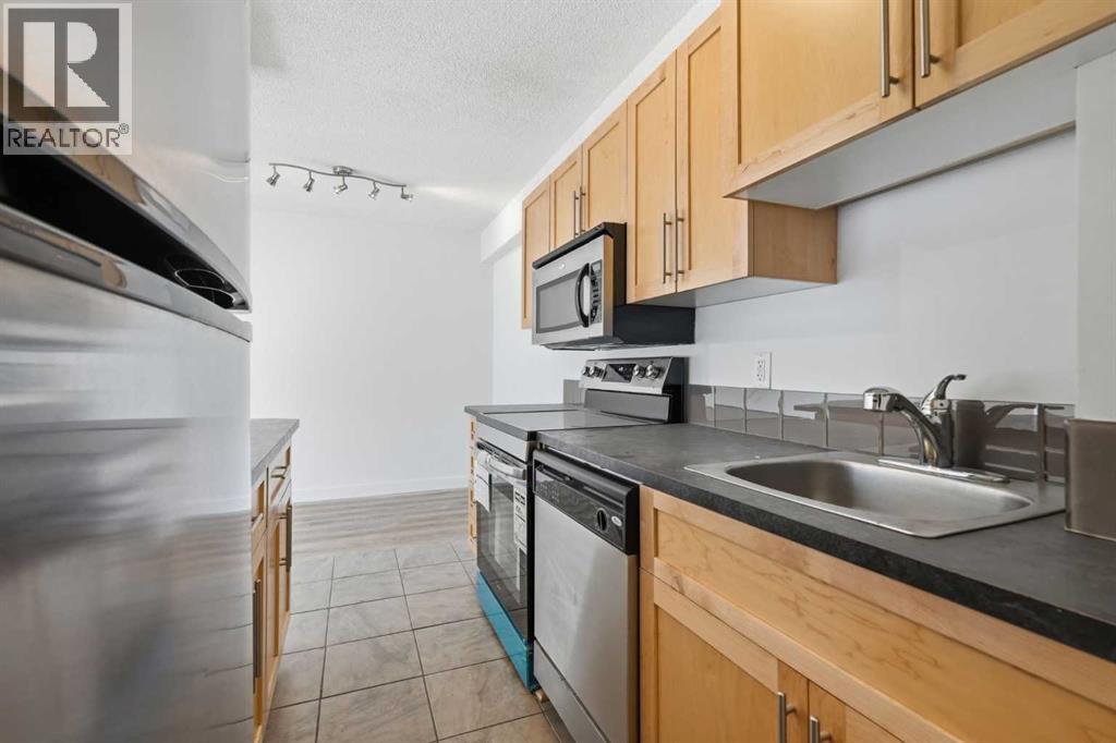 Apartment for Sale in 402, 620 15 Avenue SW|Calgary, Alberta T2R0R5 5