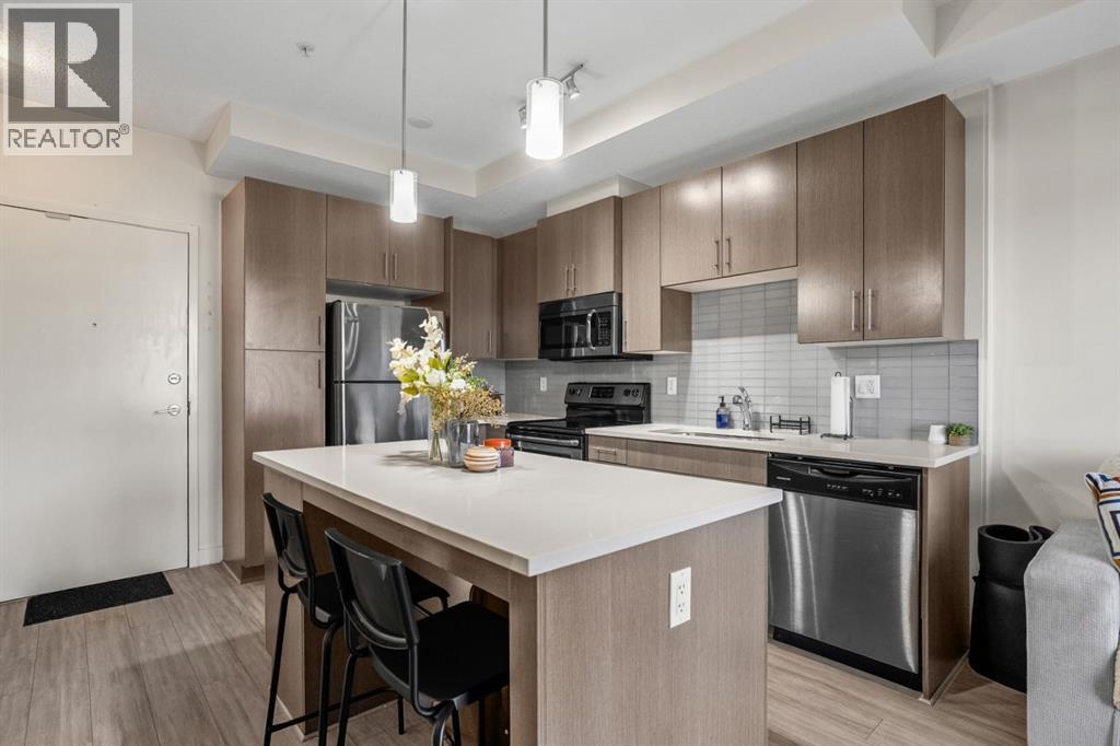 Apartment for Sale in 201, 15233 1 Street SE|Calgary, Alberta T2X0X1 2