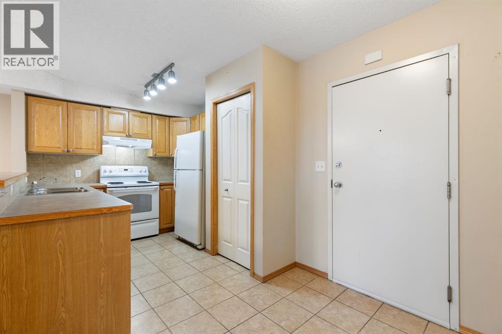 Apartment for Sale in 311, 92 Saddletree Court NE|Calgary, Alberta T3J0K9 4