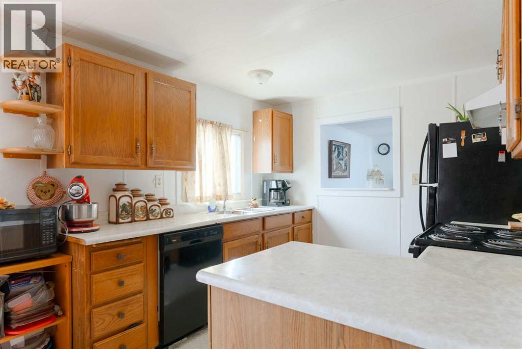 Mobile Home for Sale in 302, 6220 17 Avenue SE|Calgary, Alberta T2A0W6 4