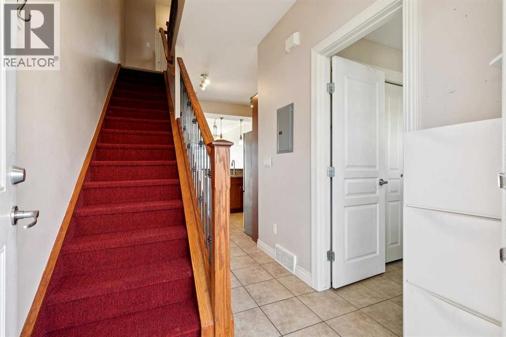 Row / Townhouse for Sale in 14, 169 Rockyledge View NW|Calgary, Alberta T3G6B1 2