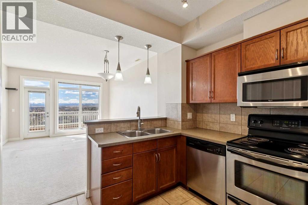 Row / Townhouse for Sale in 14, 169 Rockyledge View NW|Calgary, Alberta T3G6B1 5