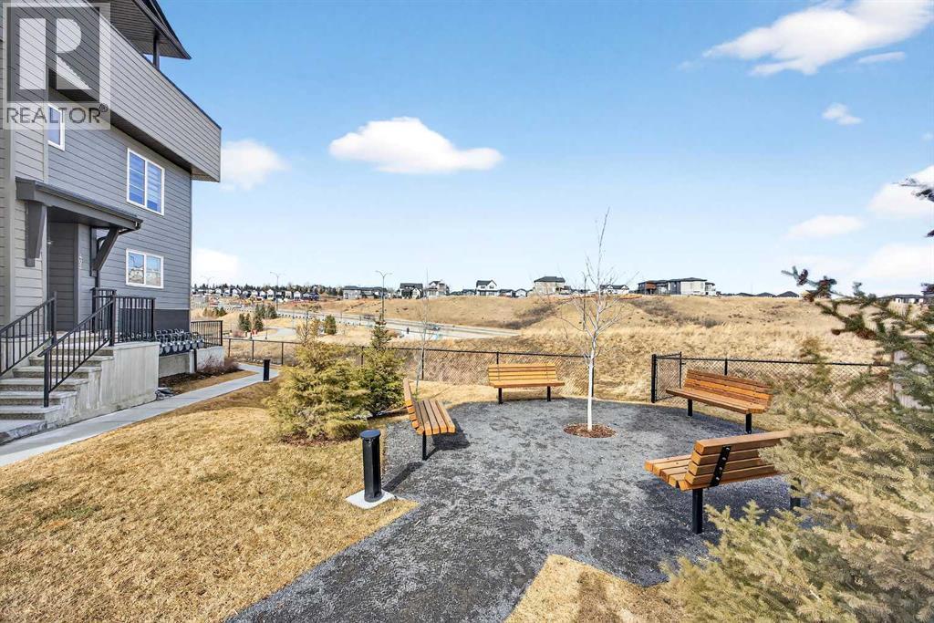 Row / Townhouse for Sale in 412, 260 Rowley Way NW|Calgary, Alberta T3L0H5 2