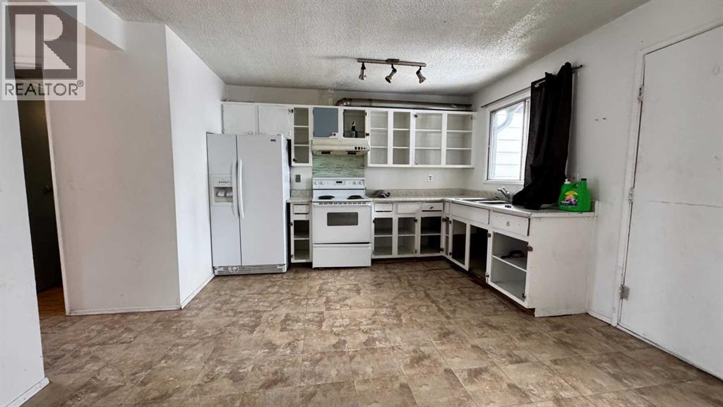 Row / Townhouse for Sale in 6551 Huntsbay Road NW|Calgary, Alberta T2K5R3 4