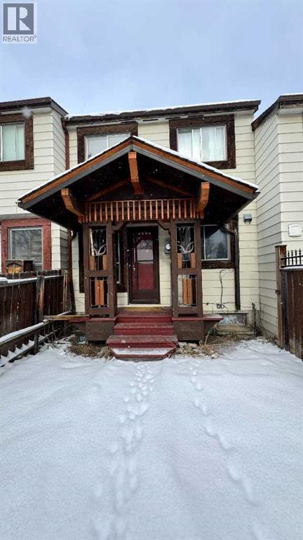 Row / Townhouse for Sale in 6551 Huntsbay Road NW|Calgary, Alberta T2K5R3 2