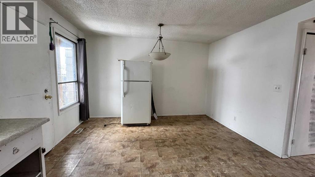 Row / Townhouse for Sale in 6551 Huntsbay Road NW|Calgary, Alberta T2K5R3 5