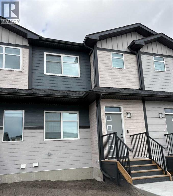 Row / Townhouse for Sale in 303 Wolf River Drive SE|Calgary, Alberta T2X6G6