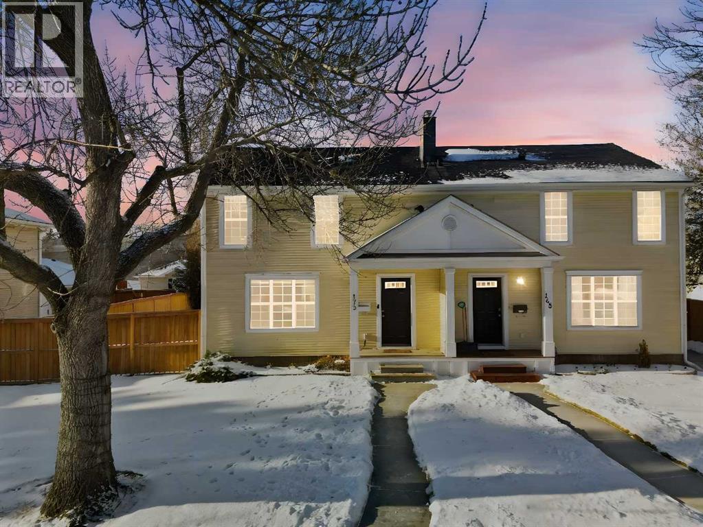 Duplex for Sale in 172 Somme Manor SW|Calgary, Alberta T2T6L5