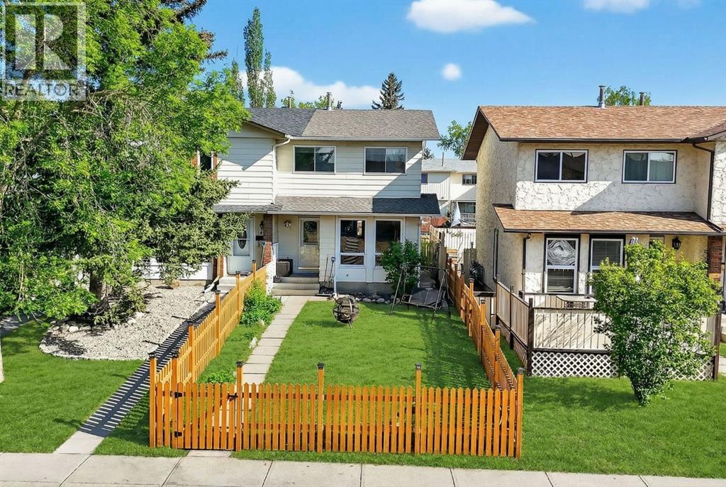 Row / Townhouse for Sale in 161 Midbend Place SE|Calgary, Alberta T2X2K1