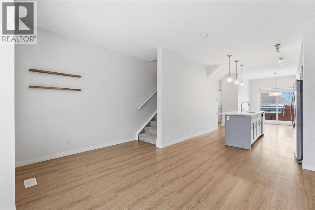 Row / Townhouse for Sale in 84 Shawnee Common SW|Calgary, Alberta T2Y0P9 3