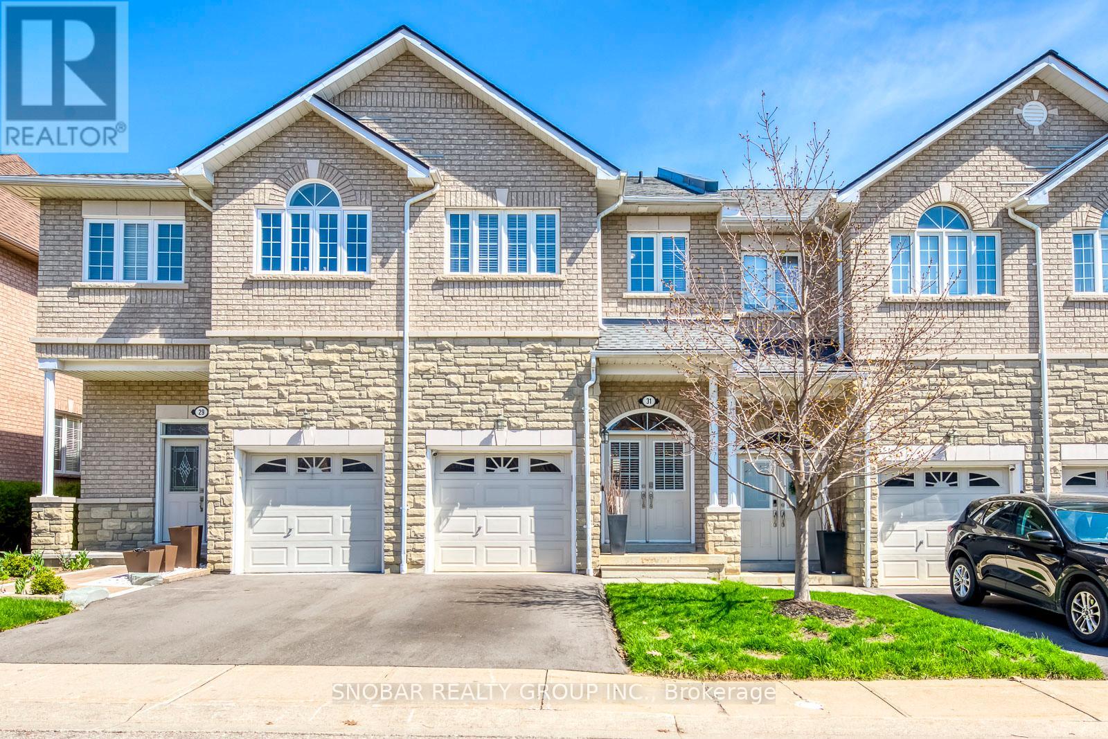 Row / Townhouse for Sale in 31 - 470 FAITH DRIVE|Mississauga (Hurontario), Ontario L5R4E8 2