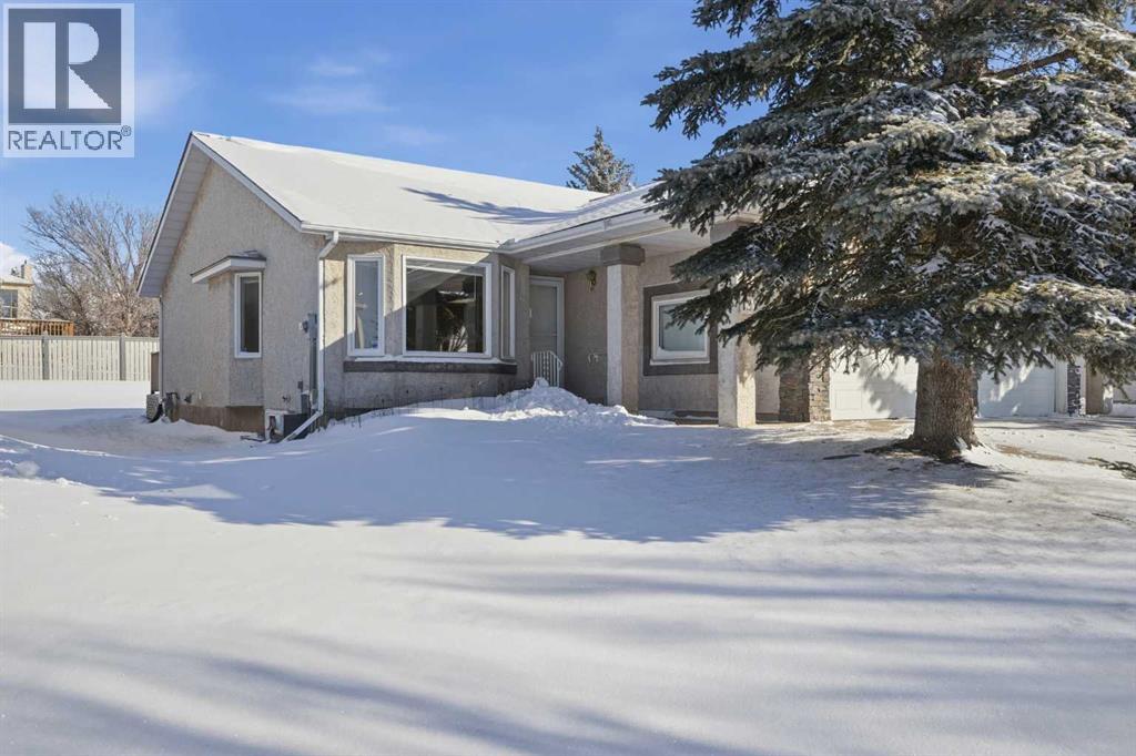 Duplex for Sale in 12 Arbour Cliff Close NW|Calgary, Alberta T3G3W8
