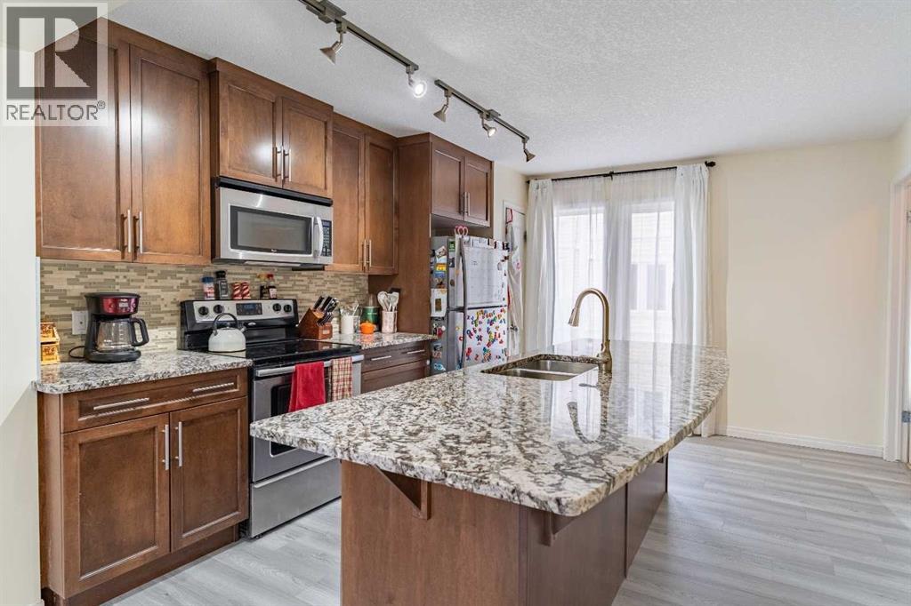 Row / Townhouse for Sale in 37 Auburn Bay Link SE|Calgary, Alberta T3M0Y5