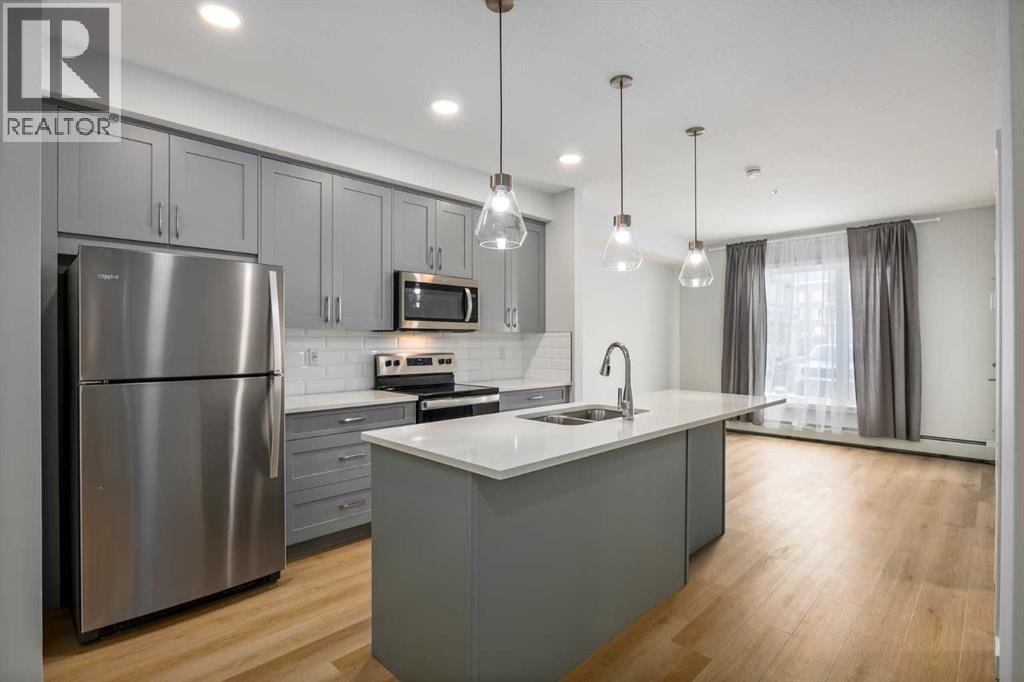 Apartment for Sale in 101, 200 Shawnee Square SW|Calgary, Alberta T2Y0T7