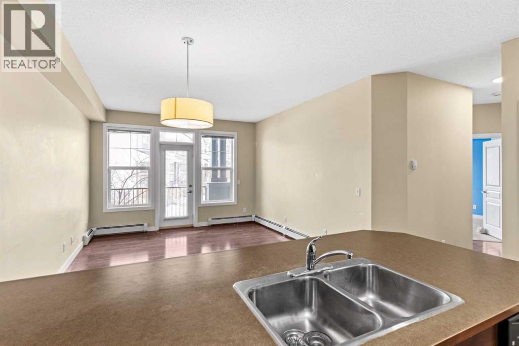 Apartment for Sale in 212, 10 Panatella Road NW|Calgary, Alberta T3K0V4 5