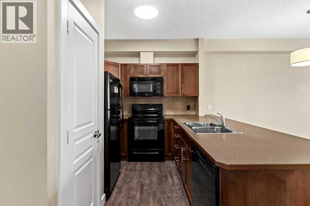 Apartment for Sale in 212, 10 Panatella Road NW|Calgary, Alberta T3K0V4 4