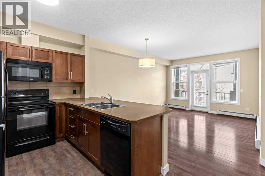 Apartment for Sale in 212, 10 Panatella Road NW|Calgary, Alberta T3K0V4 3
