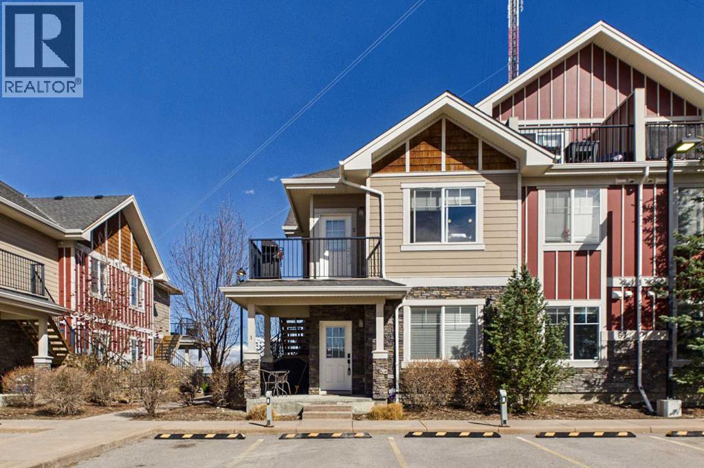 Row / Townhouse for Sale in 1, 67 West Coach Manor SW|Calgary, Alberta T3H1R7