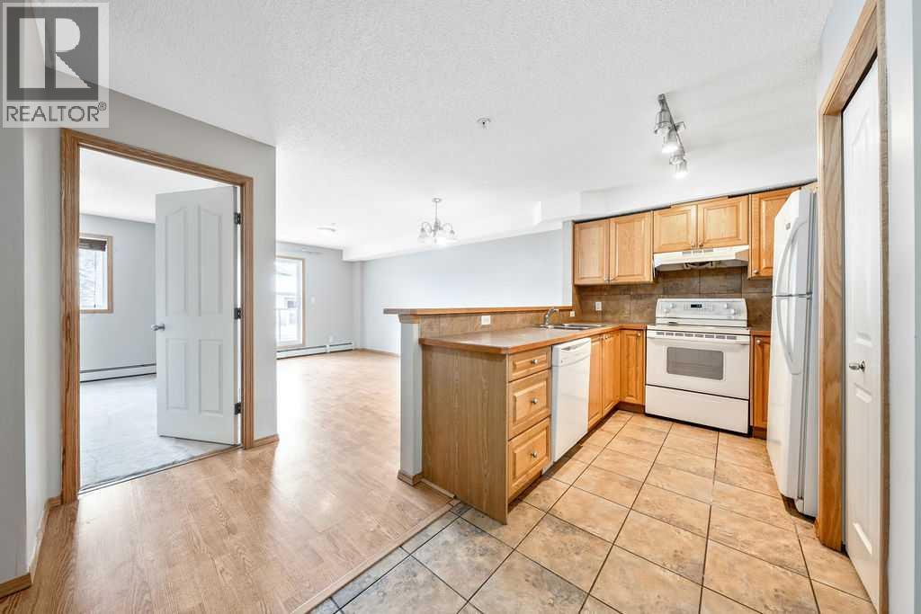 Apartment for Sale in 103, 92 Saddletree Court NE|Calgary, Alberta T3J0K9 2