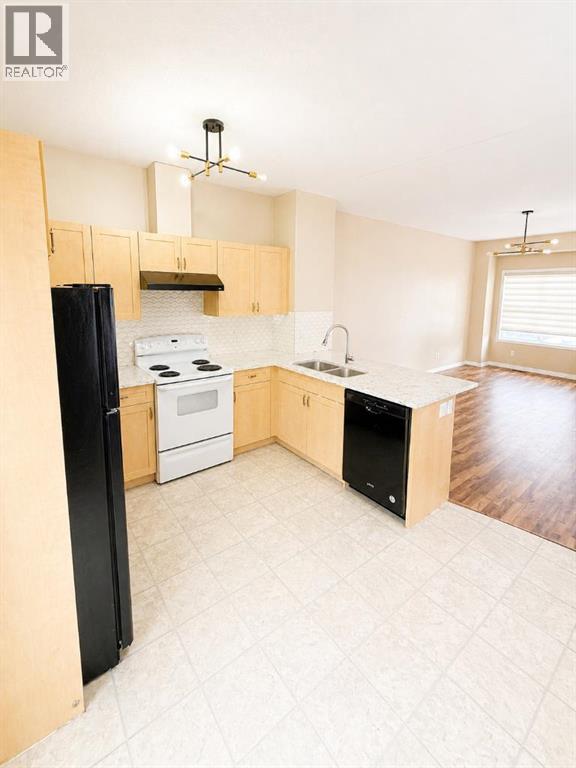 Row / Townhouse for Sale in 204, 111 Tarawood Lane NE|Calgary, Alberta T3J0C1 2