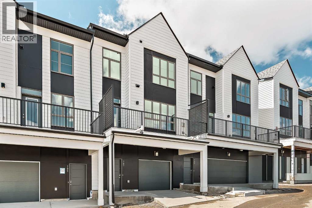 Row / Townhouse for Sale in 717 Sovereign Common SW|Calgary, Alberta T3C3Y3