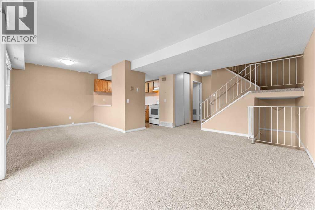 Row / Townhouse for Sale in 1202, 2200 Woodview Drive SW|Calgary, Alberta T2W3N6 3