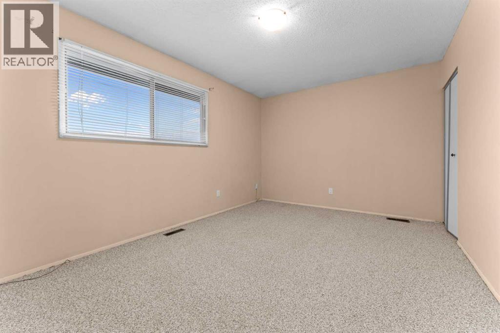 Row / Townhouse for Sale in 1202, 2200 Woodview Drive SW|Calgary, Alberta T2W3N6 5