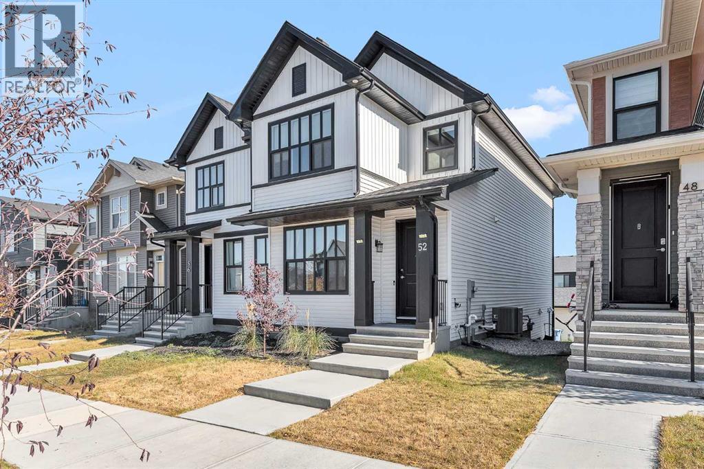 Duplex for Sale in 52 Edith Gate NW|Calgary, Alberta T3A1Z2