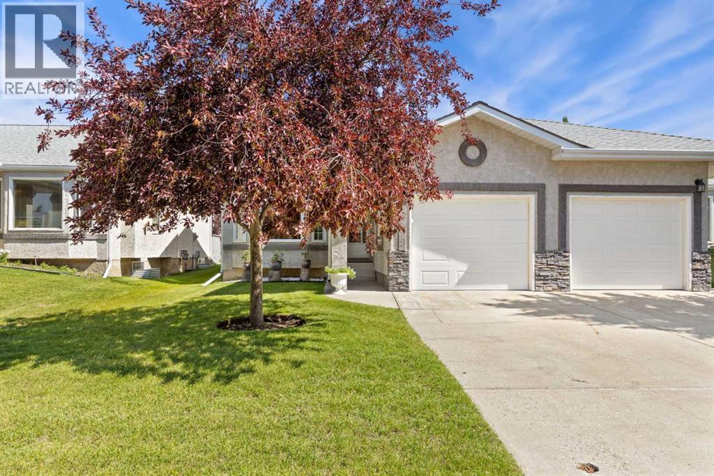 Duplex for Sale in 217 Arbour Cliff Close NW|Calgary, Alberta T3G3W7