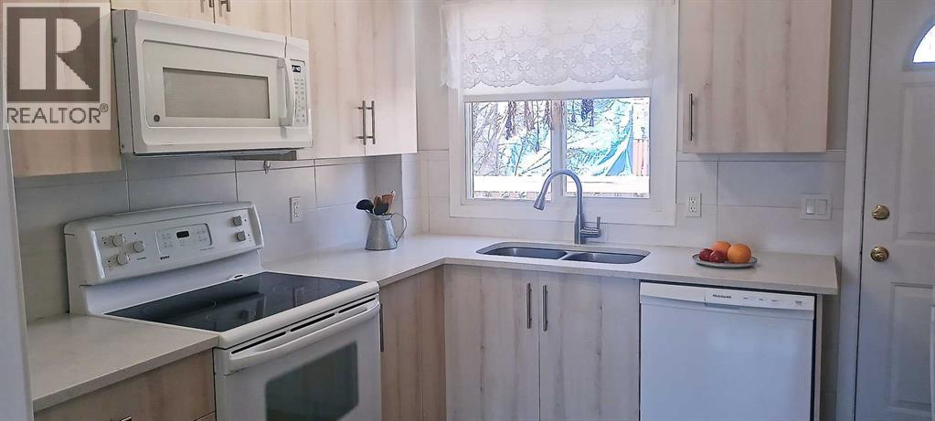 Row / Townhouse for Sale in 1105 53 Street SE|Calgary, Alberta T2A1V5 2