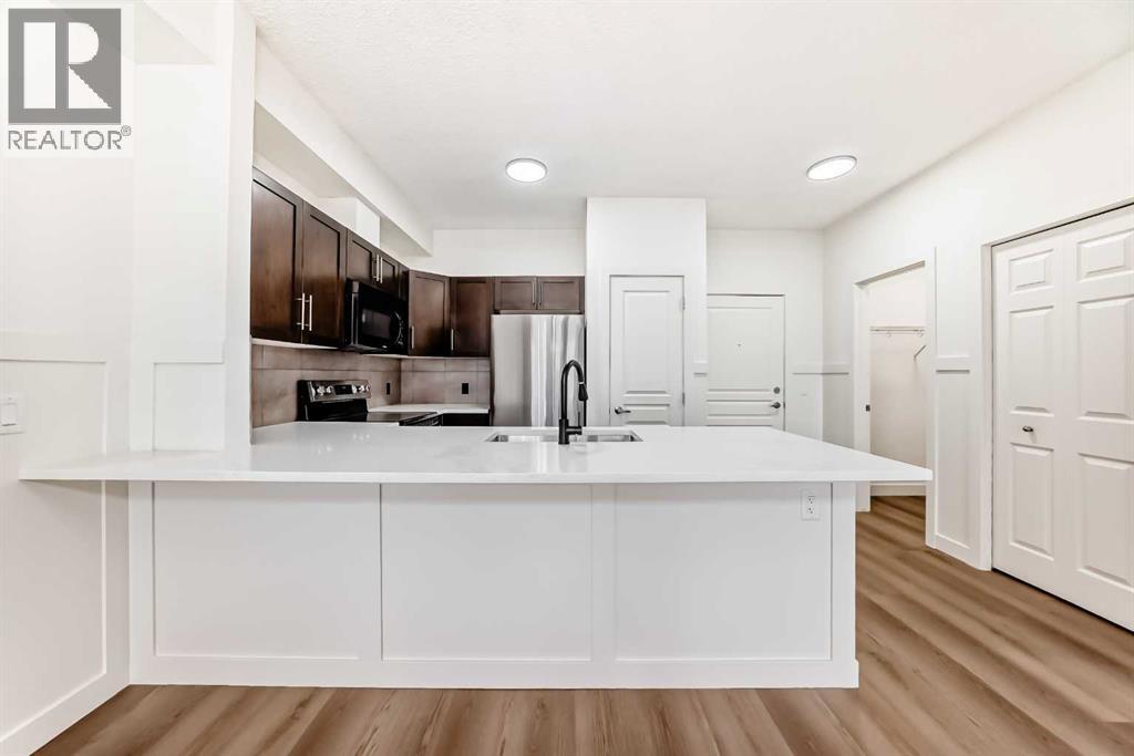 Apartment for Sale in 101, 22 Panatella Road NW|Calgary, Alberta T3K0V4 5