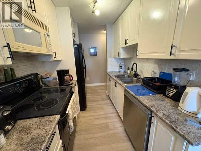 Apartment for Sale in 703, 11620 Elbow Drive SW|Calgary, Alberta T2W3L6 3