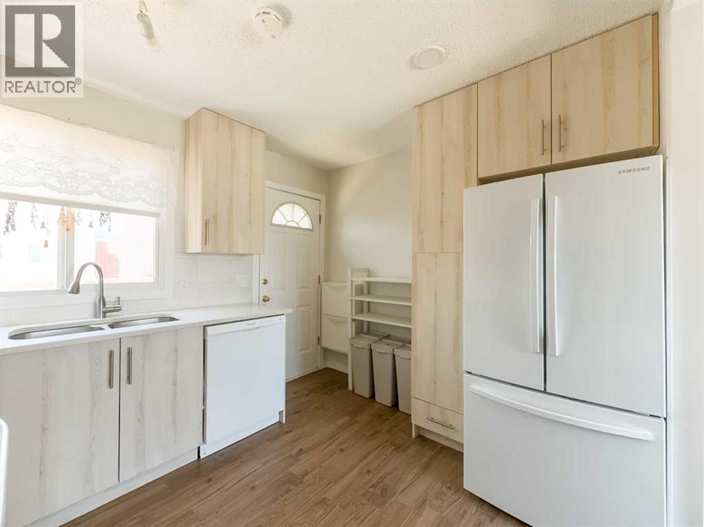 Row / Townhouse for Sale in 1105 53 Street SE|Calgary, Alberta T2A1V5 3