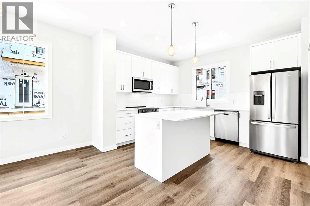 Row / Townhouse for Sale in 101, 40 Creekside Way SW|Calgary, Alberta T2X6E2