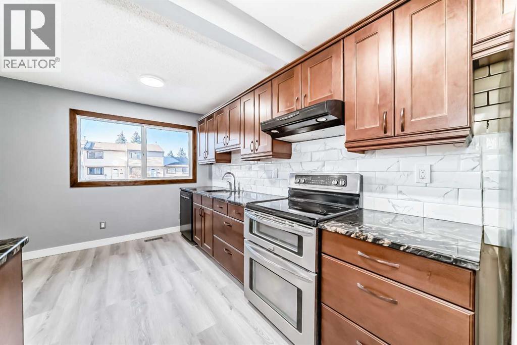 Row / Townhouse for Sale in 65, 6100 4 Avenue NE|Calgary, Alberta T2A5Z8 5