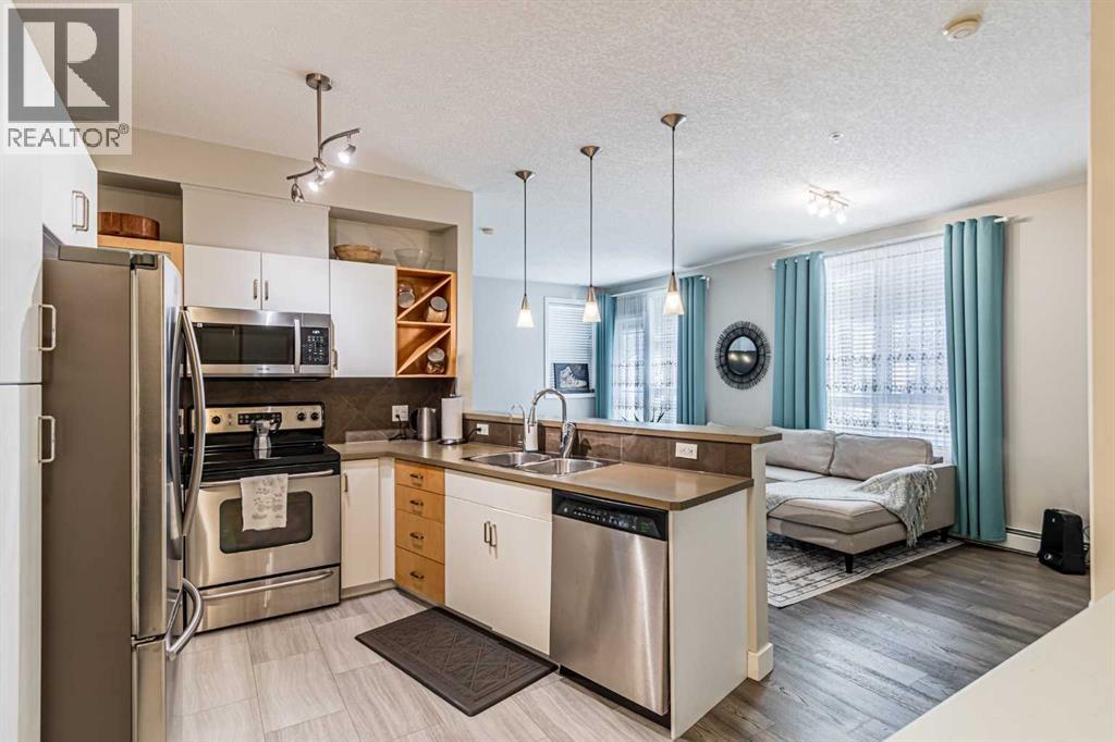 Apartment for Sale in 118, 3600 15A Street SW|Calgary, Alberta T2T5P8 3