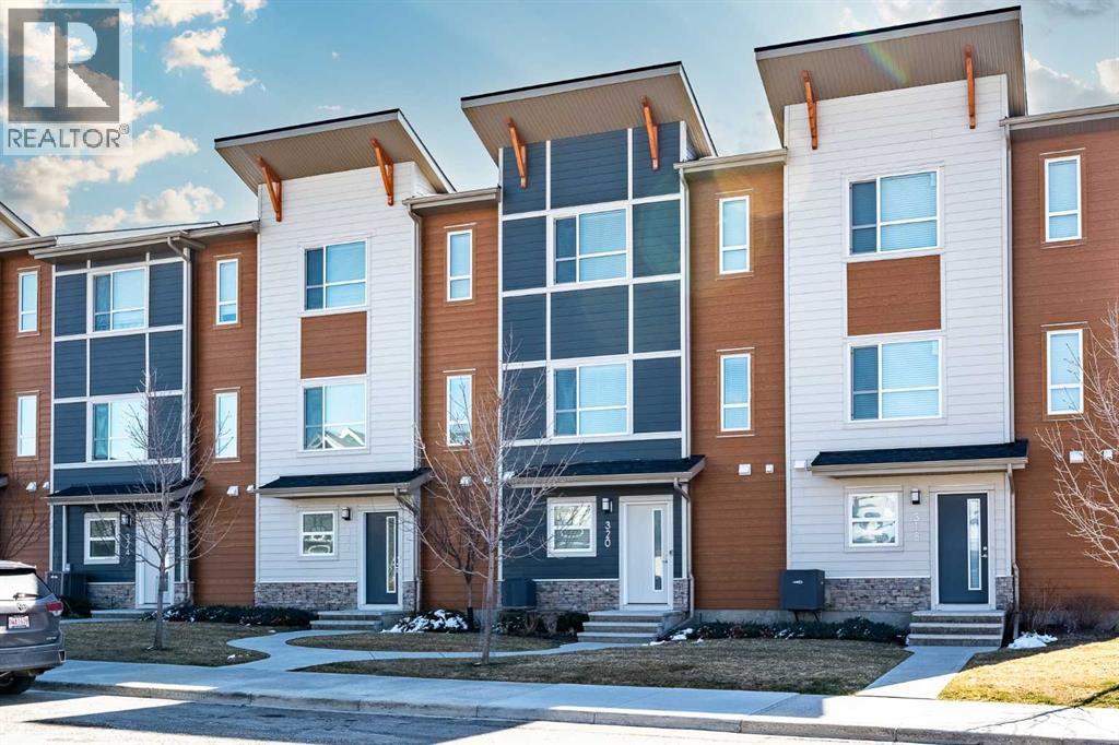 Row / Townhouse for Sale in 320 Harvest Hills Way NE|Calgary, Alberta T3K2P3