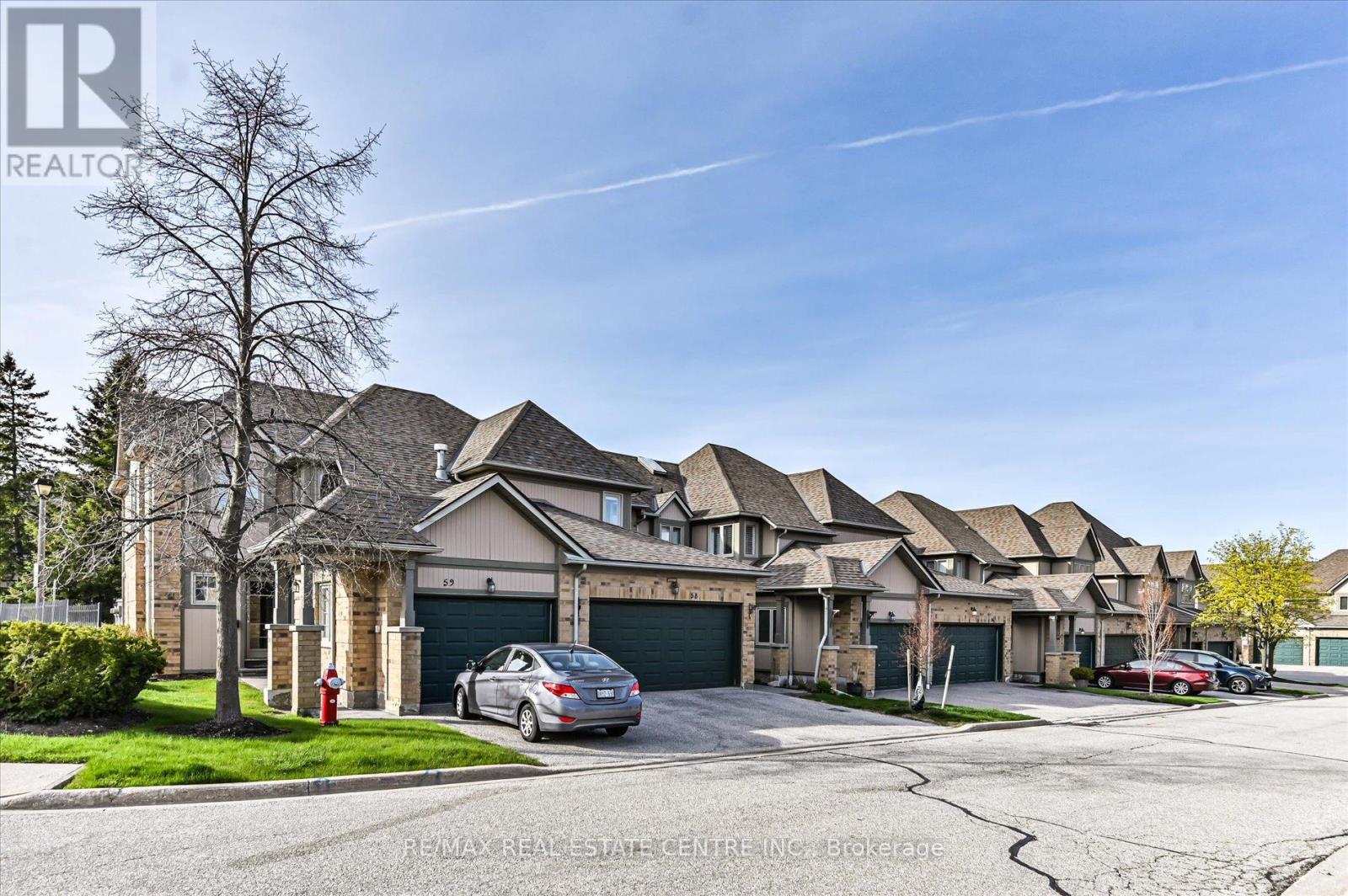 Row / Townhouse for Sale in 58 - 5662 GLEN ERIN DRIVE|Mississauga (Central Erin Mills), Ontario L5M6C4