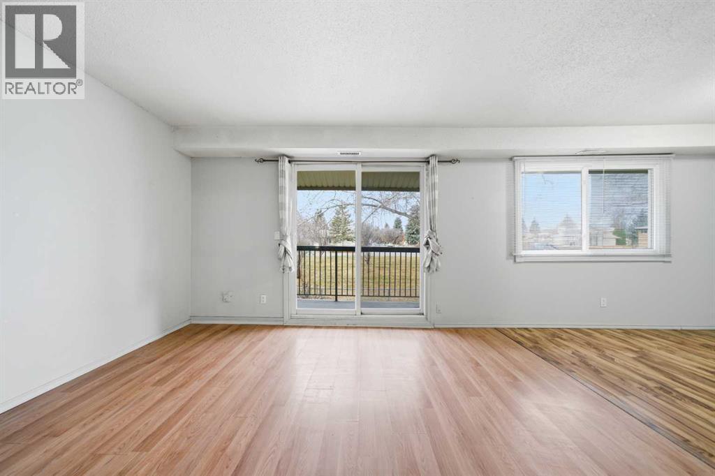 Row / Townhouse for Sale in 306, 2200 Woodview Drive SW|Calgary, Alberta T2W3N6 4