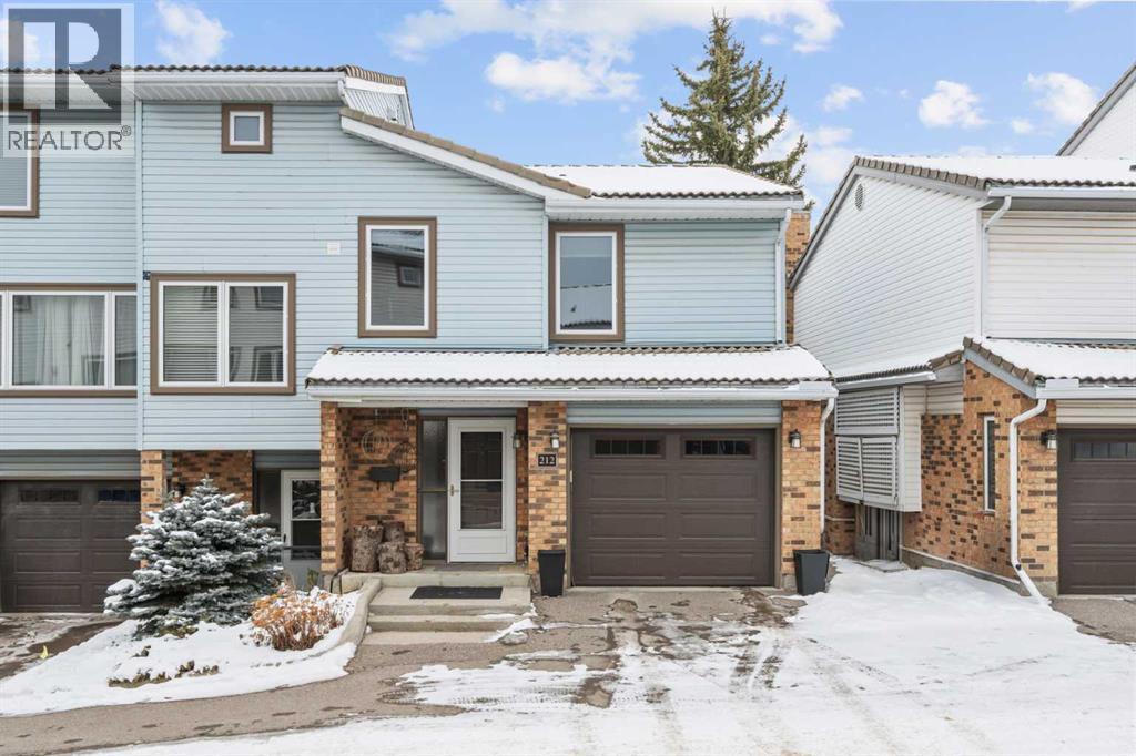 Row / Townhouse for Sale in 212 Coachway Lane SW|Calgary, Alberta T3H2V9