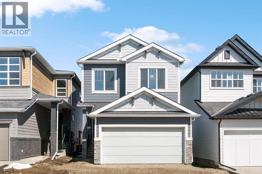 House for Sale in 623 Buffaloberry Manor SE|Calgary, Alberta T3M3Z2