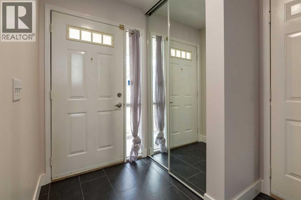 Row / Townhouse for Sale in 318 Hawkstone Manor NW|Calgary, Alberta T3G3X2 2