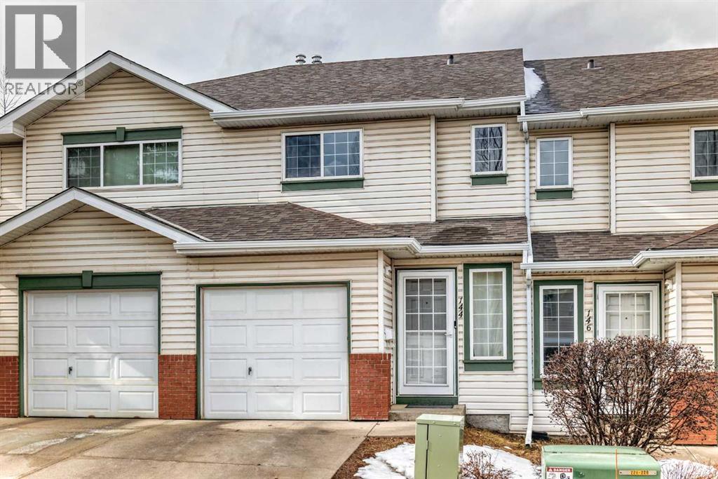 Row / Townhouse for Sale in 144 Country Hills Villas NW|Calgary, Alberta T3K4S8