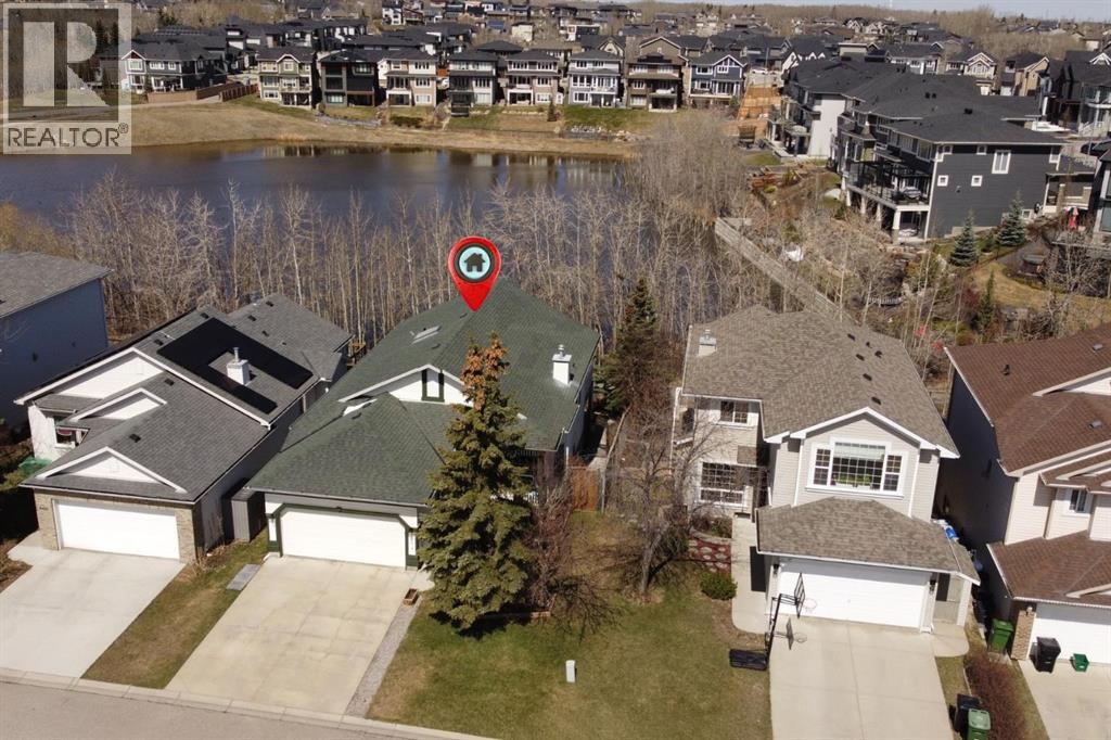 House for Sale in 402 Rocky Ridge Cove NW|Calgary, Alberta T3G4J6