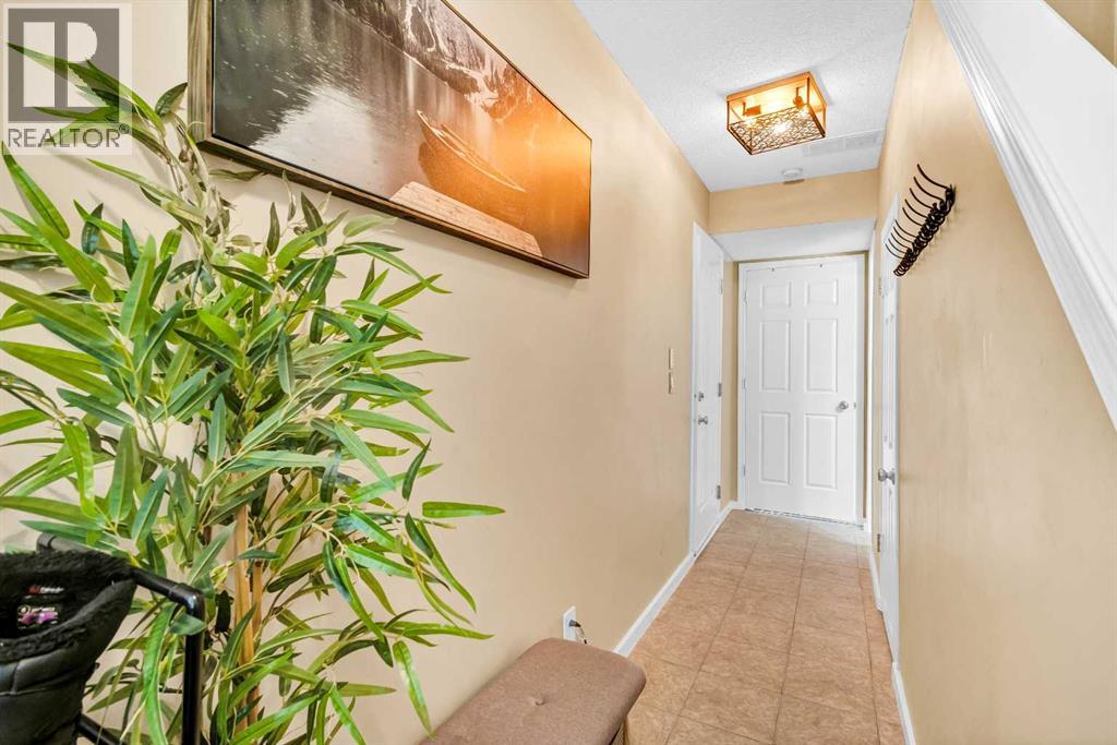 Row / Townhouse for Sale in 3, 200 Hidden Hills Terrace NW|Calgary, Alberta T3A6E8 3